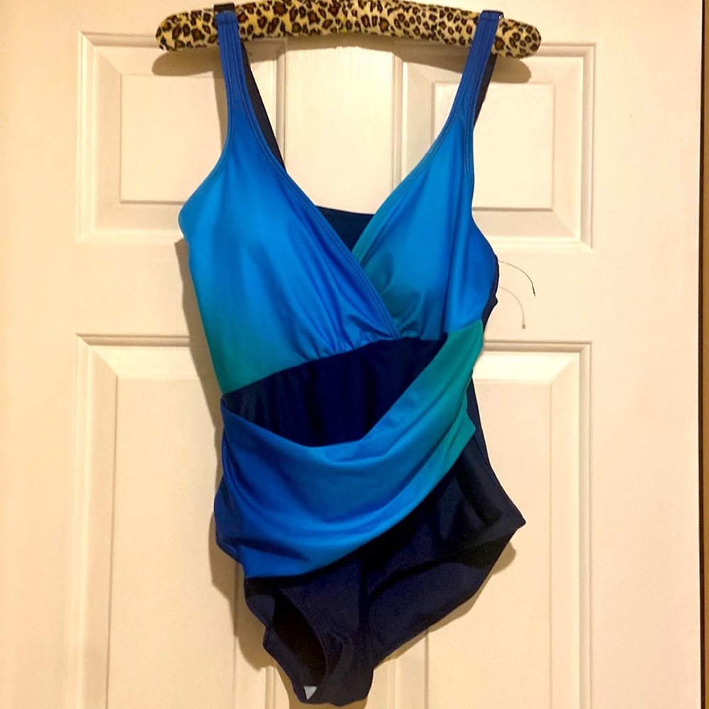 Like new tummy taming one piece swimsuit